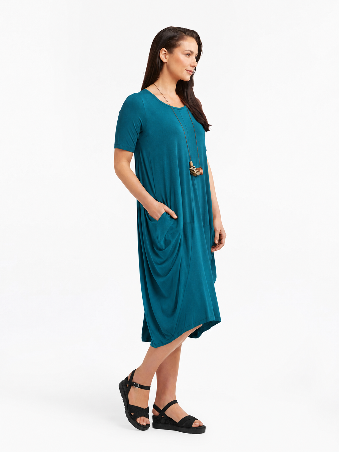 Lani short sleeve tulip dress in Bright Peacock — side view