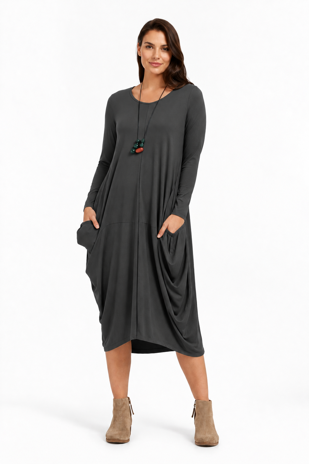 Leilani Dress in Graphite Grey – front view showing the round neckline, long sleeves and draped pockets