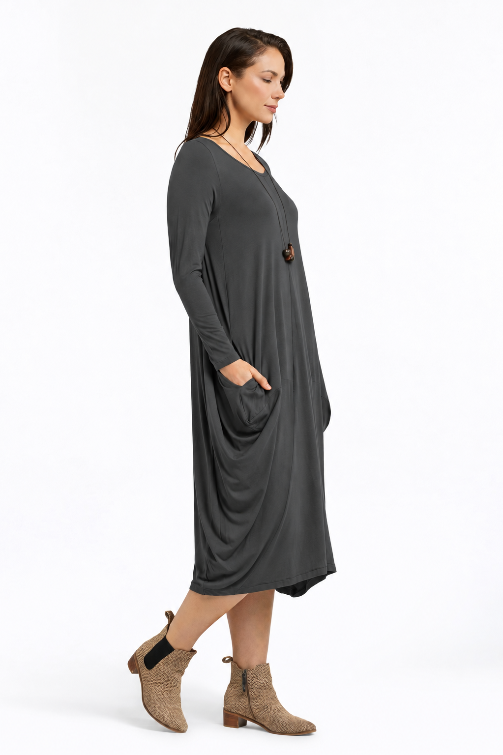 Leilani Dress in Graphite Grey – side view showing the side drape and hemline