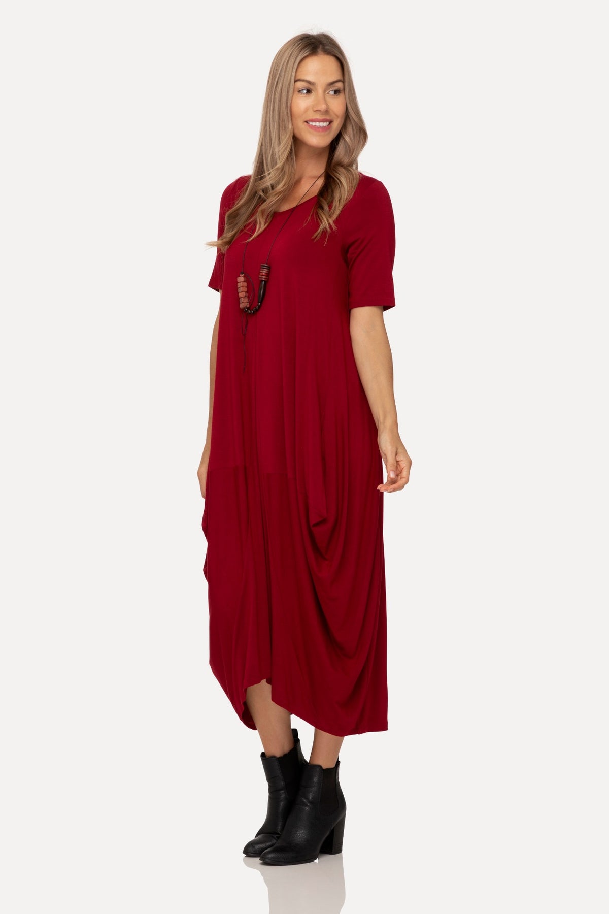 Lani short sleeve tulip dress in Dark Cherry Red — angled view