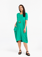 Lani short sleeve tulip dress in Aqua Green — front view