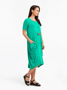 Lani short sleeve tulip dress in Aqua Green — side view