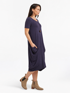 Lani short sleeve tulip dress in Berry Blue — side view