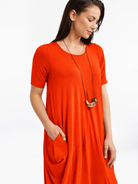Lani short sleeve tulip dress in Orange Red — detail view