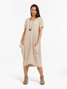 Lani short sleeve tulip dress in Sand Beige — front view
