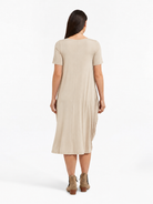 Lani short sleeve tulip dress in Sand Beige — back view