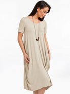 Lani short sleeve tulip dress in Sand Beige — detail view
