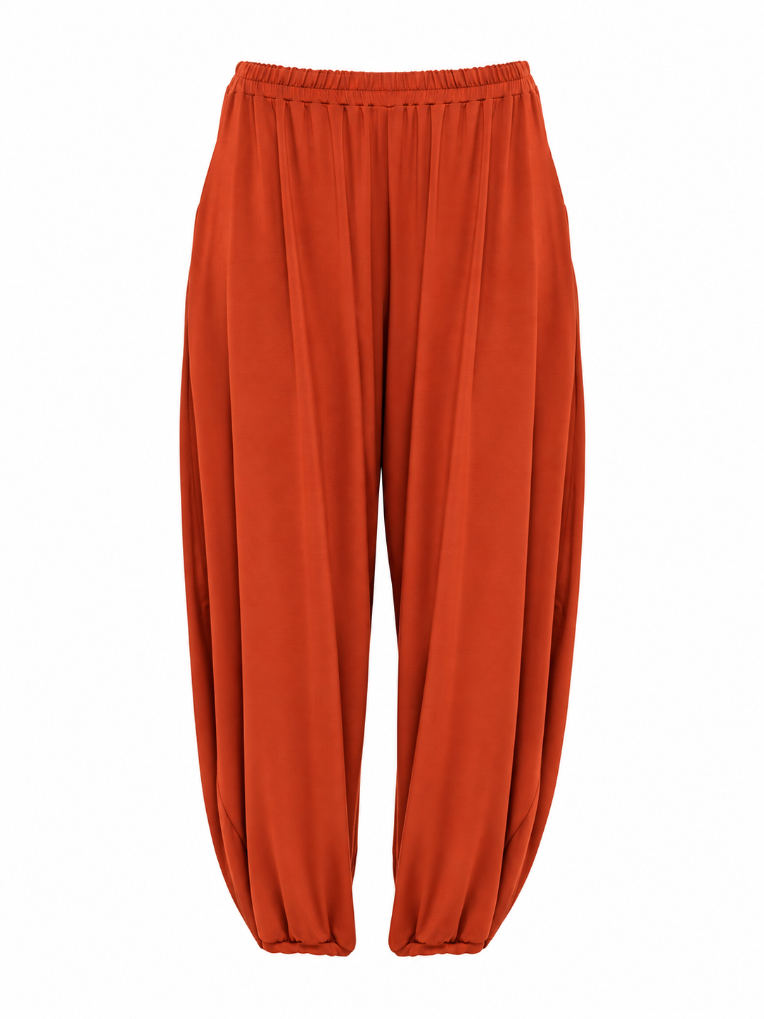 Product-only view of Rust Orange Akira Barrel Pants, showing the elastic waistband and barrel silhouette.