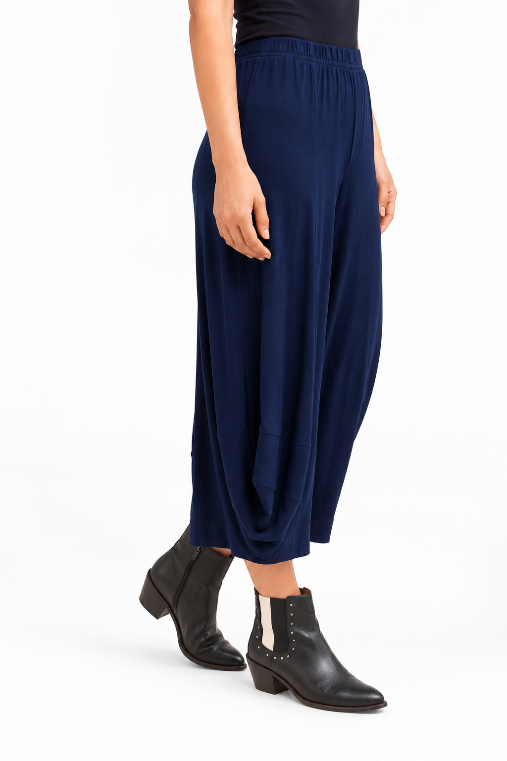 Angled side view of the Bright Navy Blue Marlee Wide Leg Pants, showing the side drape and leg shape.