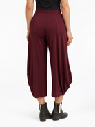 back view of the Shiraz Red Marlee Wide Leg Pants, showing the back fit and cocoon hem