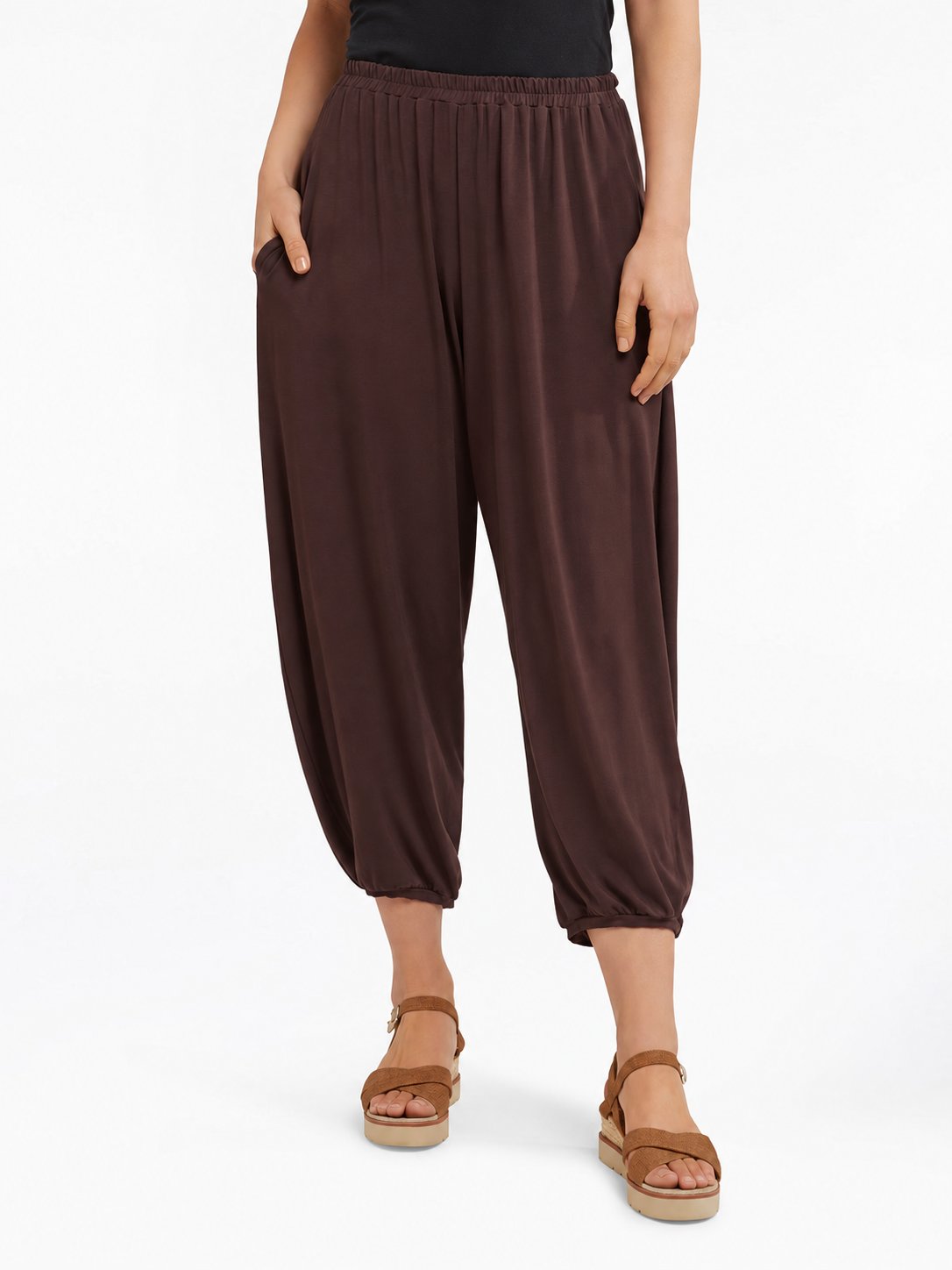 Front view of Cocoa Brown Akira Barrel Pants, showing the elastic waistband, side pockets and tapered cropped legs.